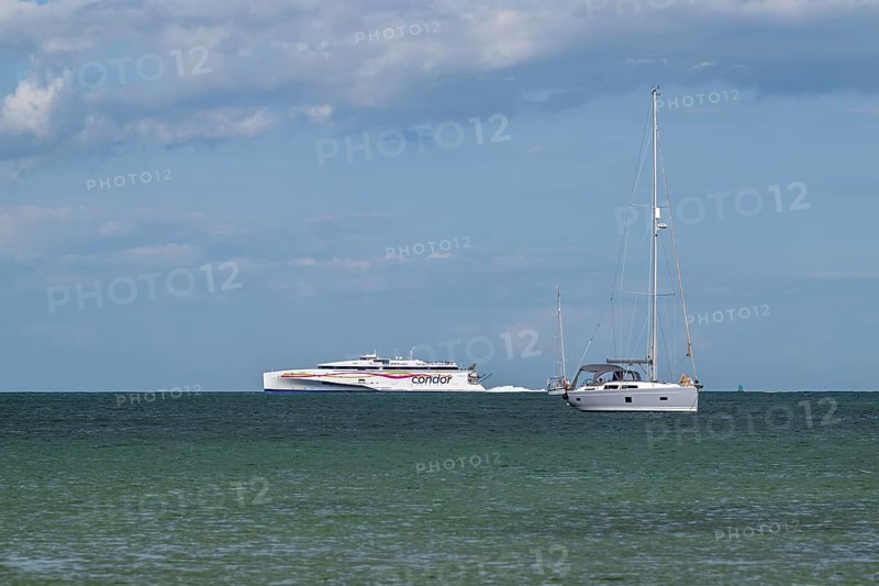 Boats on sea over Knoll Beach Studland, Poole, Dorset, England, United Kingdom