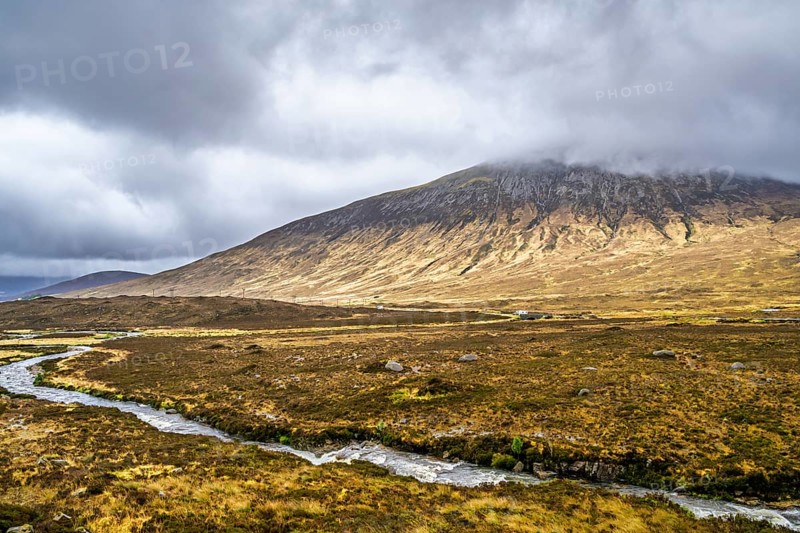 Eas a' Bhradain waterfall, Red Cuillin mountains, Loch Ainort, Isle of Skye, Scotland, UK