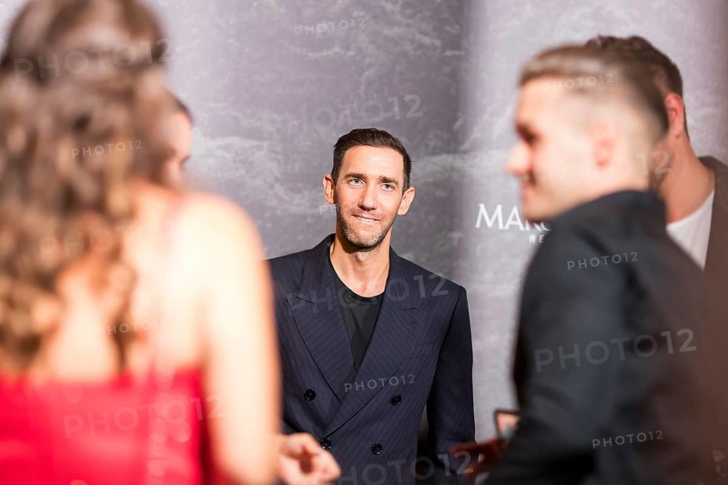 Marcel Remus between visitors at the Remus Lifestyle Night on 31 July 2025 on the roof terrace of the Pure Salt Hotel in Magaluf, Majorca, Spain