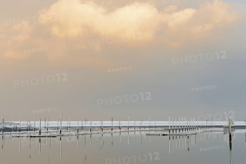 Winter day, onset of winter, snow on the jetties in the marina, North Sea, Norddeich, Lower Saxony, Germany