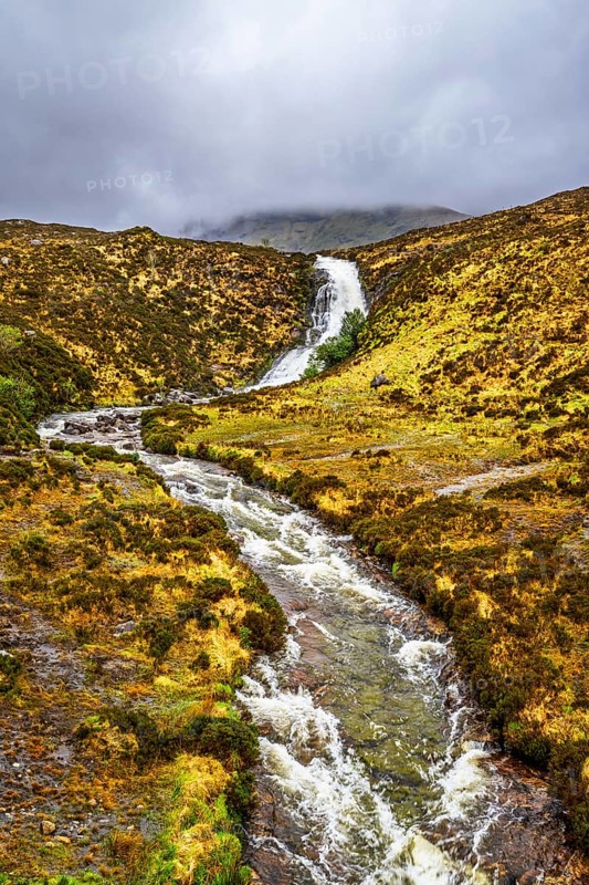Eas a' Bhradain waterfall, Red Cuillin mountains, Loch Ainort, Isle of Skye, Scotland, UK