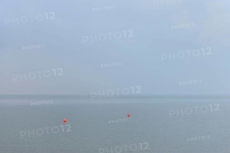 North Sea, two red buoys in the Wadden Sea, Norddeich, Lower Saxony, Germany