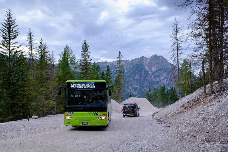 Public bus, public transport and campers on the toll road, Prato Piazza, Alta Braies, Braies Valley, Val Pusteria, South Tyrol, Italy