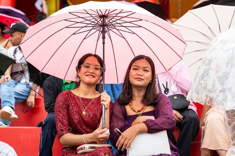 People from the Pnar community attend the Behdienkhlam festival in Jowai, India on July 14, 2025. Behdienkhlam is a vibrant annual festival celebrated by the Pnar (Jaintia) community of Meghalaya, especially in Jowai, to drive away plague and diseases and to pray for a good harvest. Observed in July after the sowing season, it features traditional rituals, offerings to ancestral spirits, and the grand procession of beautifully decorated bamboo structures called rots, which are later immersed in a sacred muddy pool known as Ka Aitnar