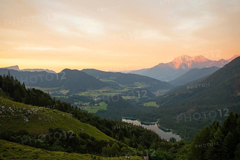 Magical sunset at the Halsalm above the Hintersee with views of the Hoher Göll and Untersberg mountains