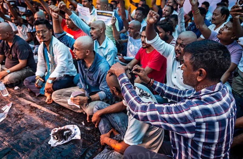Drivers affiliated with Ola, Uber, and Rapido, under the banner of the Assam State Drivers' Union and the All Assam Cab Welfare Federation, shaved their heads in protest in Guwahati, India, on July 22, 2025. The demonstration held to highlight their demands for fair fare rates, regulation of aggregator commissions, and access to social security and welfare benefits