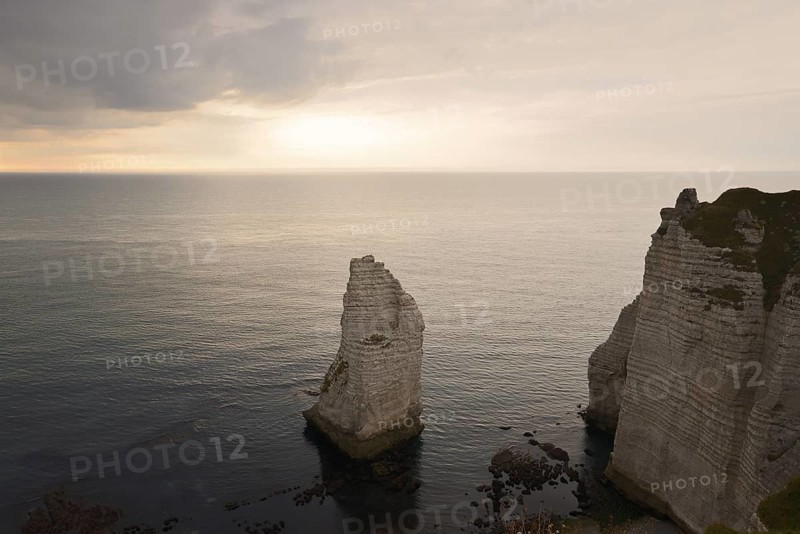 Aiguille d'Etretat rock needle at sunset, Etretat, Alabaster Coast, Seine-Maritime, Normandy, France