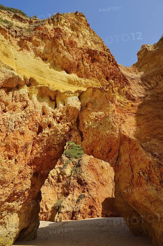 Rock formation on the coast, Praia dos Tres Irmaos, Alvor, Algarve, Portugal