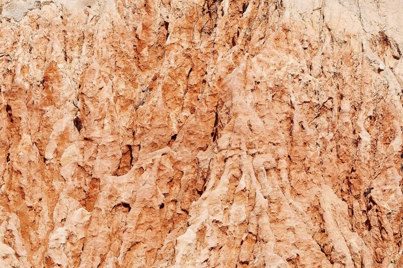 Eroded sandstone cliffs on the coast, Algarve, Portugal