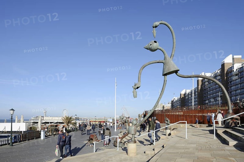 Sculpture Herring Esser by artist Tom Otterness on the seafront promenade, Scheveningen, The Hague, Dutch North Sea coast, South Holland, Netherlands