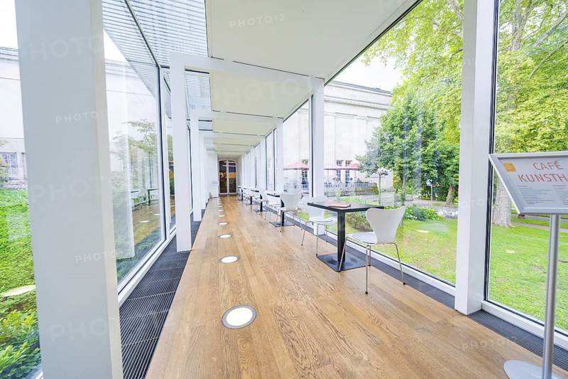A modern café with glass walls and garden views, bright and open, Frieder Burda Museum, Baden Baden, Germany