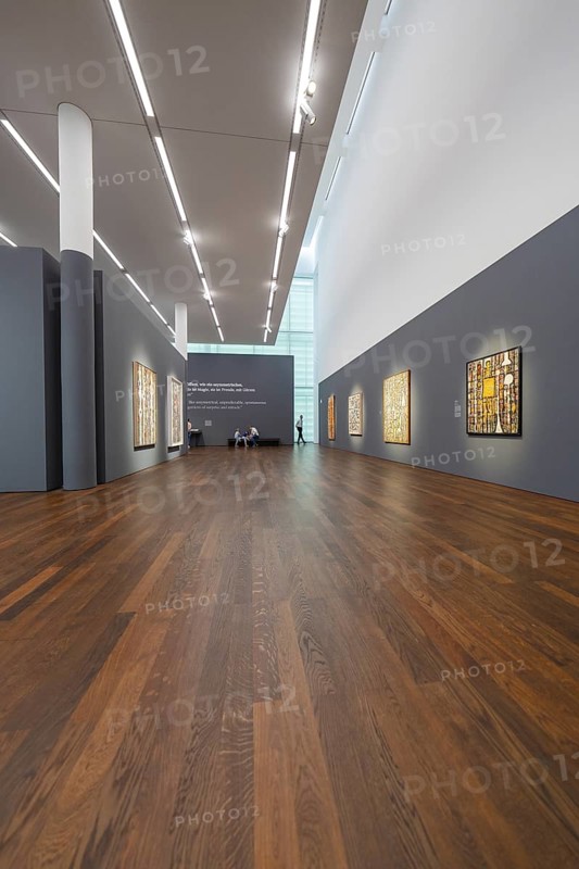 Large exhibition room with paintings on the walls and a wooden floor, Frieder Burda Museum, Baden Baden, Germany