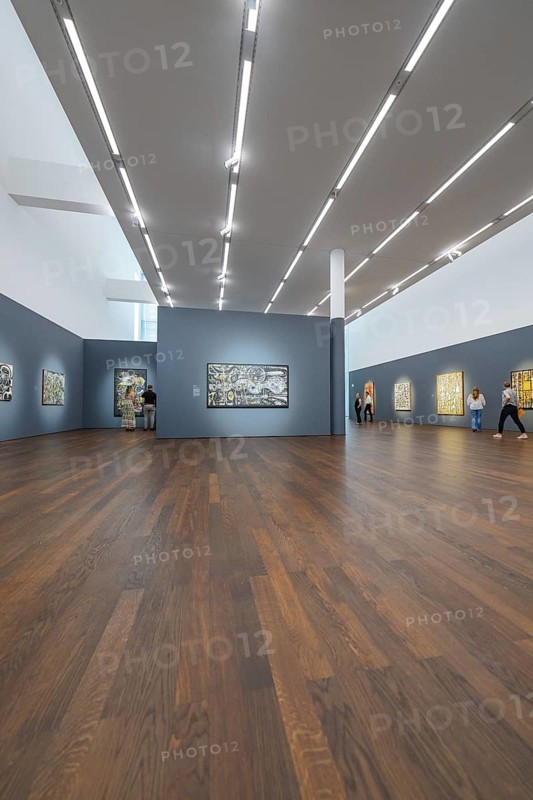 Large room with wooden floor and modern art on the walls under bright lighting, Frieder Burda Museum, Baden Baden, Germany
