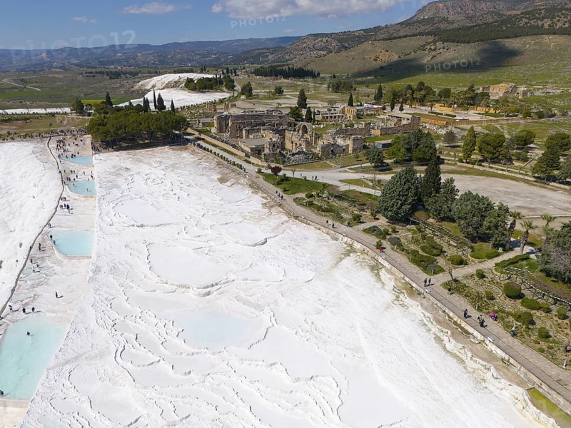 Wide view over limestone terraces and ancient ruins in a picturesque landscape, aerial view, sinter terraces, limestone sinter terraces, travertine terraces, Pamukkale, Denizli, UNESCO World Heritage Site, Anatolia, Turkey