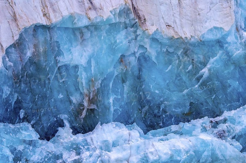 Blue ice structure of Fjortende Julibreen, 14th of July Glacier calving into Krossfjorden, Haakon VII Land, Spitsbergen, Svalbard, Norway
