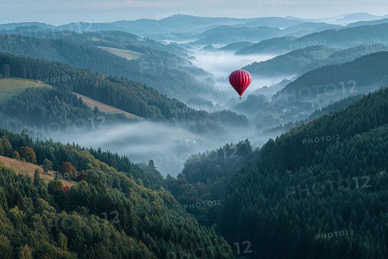 Hot air balloon red, hovering over misty fir forests in soft morning light, few autumnal colours between the treetops, view into the valley with river course, Black Forest, Germany, AI-generated, AI, AI generated