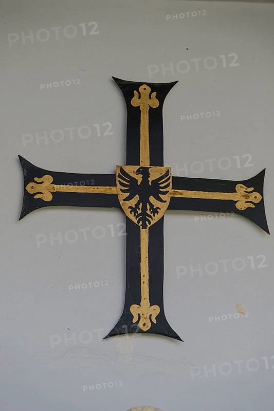 Grand Master's Cross, heraldic cross and emblem as a sign of rank and dignity, inner courtyard of the House of the Teutonic Order in Vienna, Austria, for editorial use only