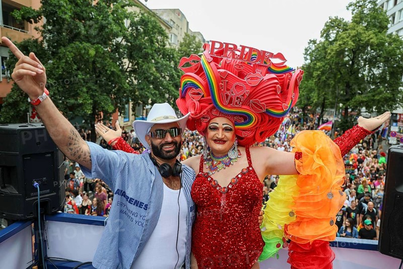 Michelle de la Rose (right) together with a DJ on one of the floats at CSD Berlin under the motto - Never be silent again - on 26 July 2025