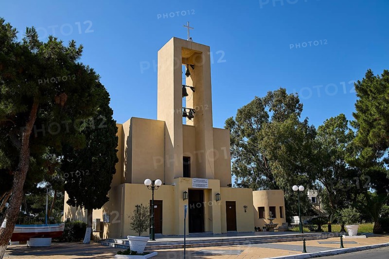 Church of Saint Francis, Church of Saint Nicholas, Agios Nikolaos, Church building with bell tower, surrounded by trees and lighting, Armando Bernabiti, Historicism, Rationalism, Art Deco, Rationalism, Rodolfo Petraco, Fascism, Portolago, Lakki, Leros, Dodecanese, Greek Islands, Greece