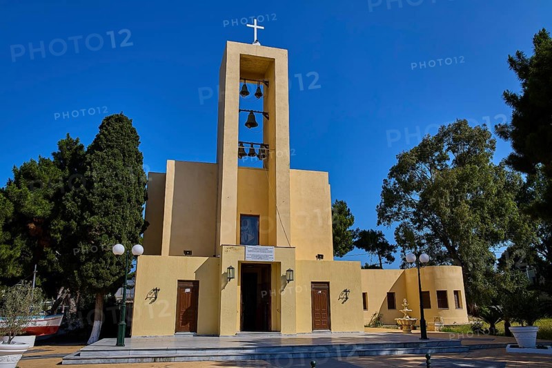 Church of Saint Francis, Church of Saint Nicholas, Agios Nikolaos, Yellow church with bells and cross surrounded by natural greenery, Armando Bernabiti, Historicism, Rationalism, Art Deco, Rationalism, Rodolfo Petraco, Fascism, Portolago, Lakki, Leros, Dodecanese, Greek Islands, Greece
