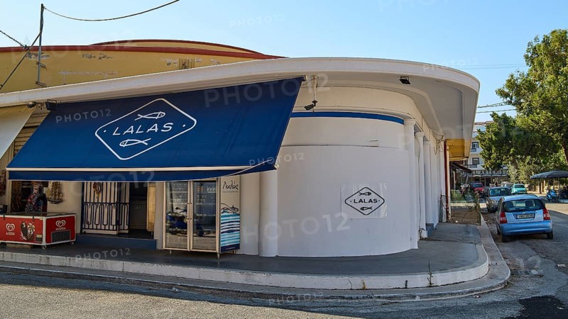 Fish market, A shop with a blue canopy on a street corner, Modern architecture, Armando Bernabiti, Historicism, Rationalism, Art Deco, Rationalism, Rodolfo Petraco, Fascism, Portolago, Lakki, Leros, Dodecanese, Greek Islands, Greece