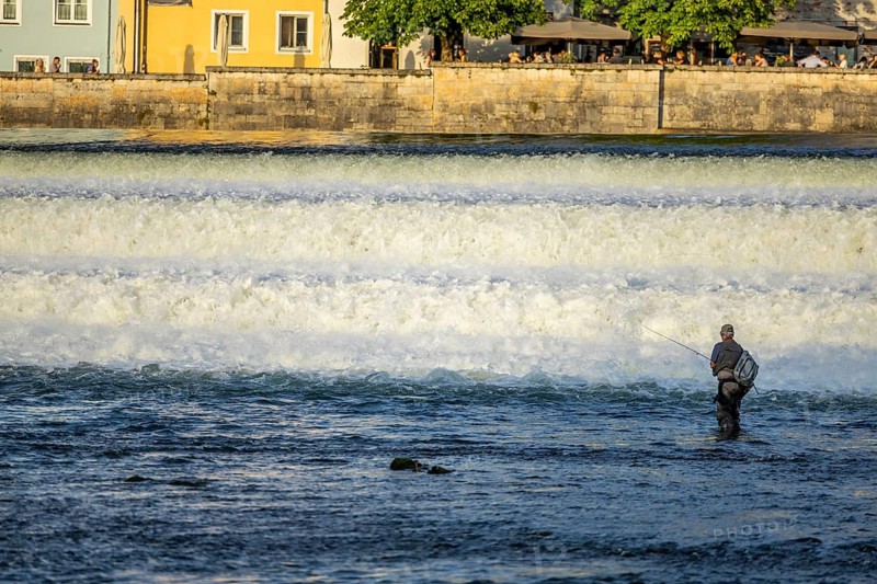 River fisherman at the barrage on the Lech, Landsberg, Upper Bavaria, Bavaria