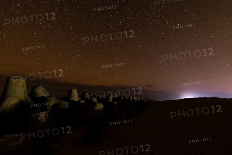 Northern Lights with Milky Way at the North Sea, Hörnum, Sylt, Tetrapode (stone), Schleswig-Holstein