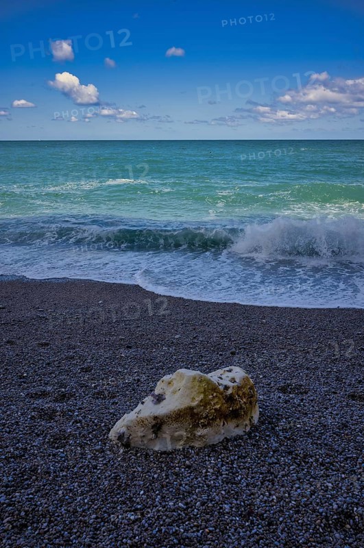 Rock on beach, pebble beach, surf, sea, clouds, Étretat, Normandy, Seine-Maritime, France