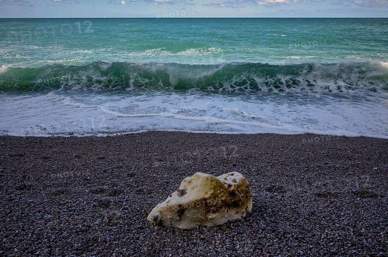Rock on beach, pebble beach, surf, sea, clouds, Étretat, Normandy, Seine-Maritime, France