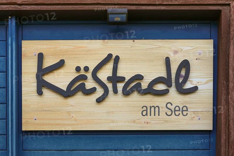 Wooden sign KäStadel am See, Kässtadel, specialist cheese shop with bistro, cheese shop, delicatessen, café, regional cuisine, small restaurant, refreshments, Oberuhldingen district, Uhldingen-Mühlhofen municipality, Lake Constance district, Baden-Württemberg, Germany