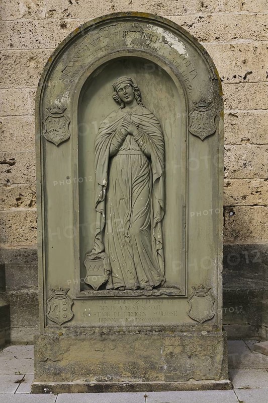 Old gravestone in front of St Martin's Church, catholic church, graceful female figure, relief, stone, dress with drapery, Dotternhausen, Zollernalbkreis, Baden-Württemberg, Germany