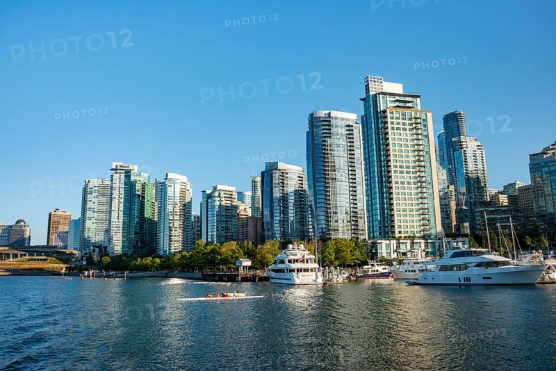 Sailing boats in marina, skyscrapers on the promenade, Coal Harbour, Vancouver, British Columbia, Canada