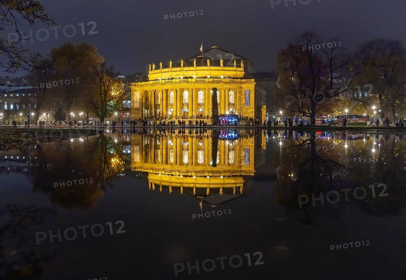 The Stuttgart Opera House is reflected in Eckensee in the evening. Stuttgart, Baden-Württemberg, Germany