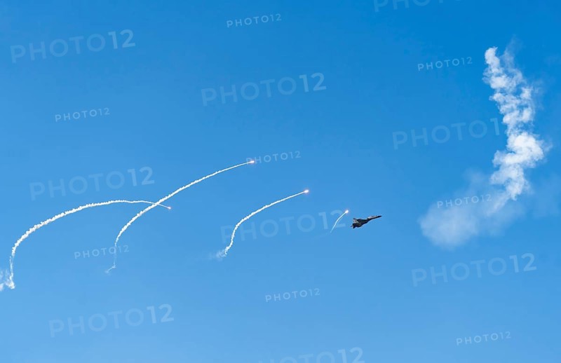 The Indian Air Force aerobatic team performs during an air show as part of the 93rd Air Force Day celebrations on November 8, 2025 in Guwahati, India
