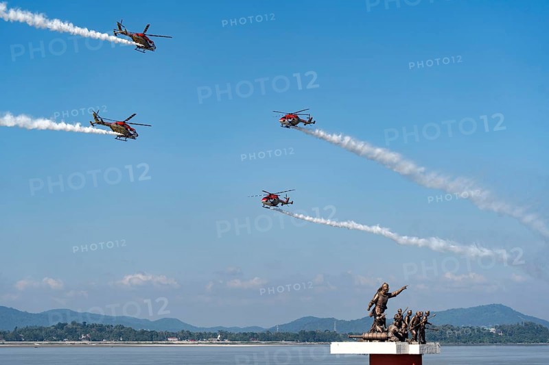 Indian Air Force (IAF) ALH Mk1 Sarang helicopters soar through the sky during an air show as part of the 93rd Air Force Day celebrations on November 8, 2025 in Guwahati, India