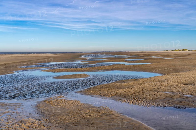 East beach of the East Frisian island of Spiekeroog, at low tide, tidal creek, watercourse at low tide, looking east towards the island of Wangerooge, Lower Saxony, Germany