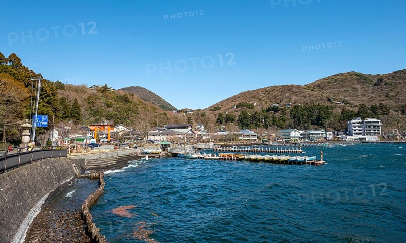 View of bay with boat docks, Motohakone town, Hakone, Japan