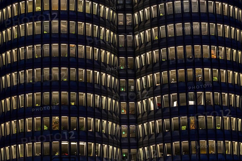 Illuminated offices at BMW headquarters, BMW four-cylinder, Petuelring, Munich, Upper Bavaria, Bavaria, Germany