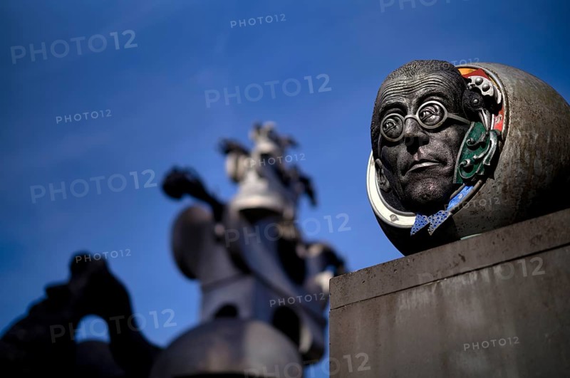 Head, sculpture in front of Villa Visconti, also House of Heads, behind Tower of the Grey Horses by Jürgen Görtz, Bietigheim-Bissingen, Baden-Württemberg, Germany