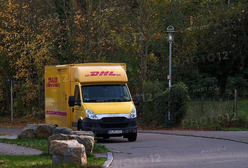 DHL delivery vehicle, logo, delivery, parked in residential area, Bietigheim-Bissingen, Baden-Württemberg, Germany