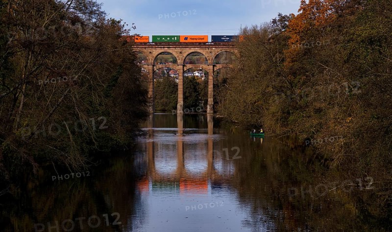 Freight train, container from Hapag-Lloyd, UASC, train stains on railway viaduct, viaduct, railway bridge, across Enz river, Bietigheim-Bissingen, Baden-Württemberg, Germany