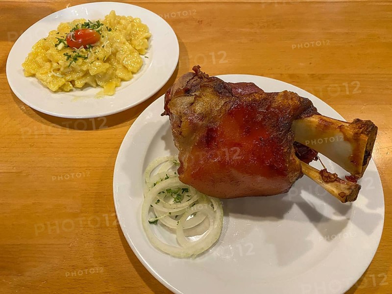 Crispy fried pork knuckle with crust, potato salad, onions, on table, food, Stuttgart, Baden-Württemberg, Germany