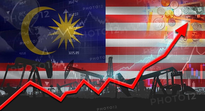 Growth of oil industry with Malaysian flag. Oil pumps with Malaysian flag. Oil production with Malaysia flag