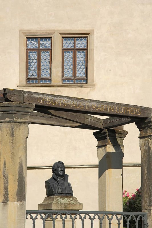UNESCO Luther's birthplace with bust of Martin Luther, memorial, inscription, Luther city Eisleben, Harz, Saxony-Anhalt, Germany