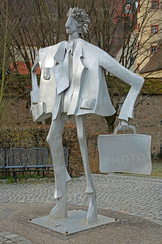 Sculpture man with suitcase by Kurt Laurenz Metzler 2007, sculpture mile, male figure, tin, carrying, hand, hand luggage, suitcase, tie, grey, modern art, An der Riviera, Ansbach, Middle Franconia, Bavaria, Germany
