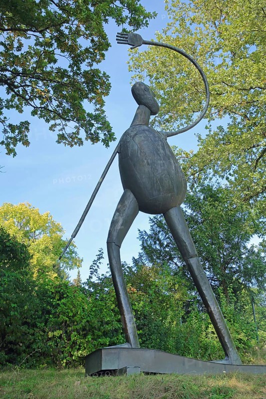 Hiker Man Sees Bright Light Sculpture by Heinrich Kirchner 1983, Modern Art, Man, Arm, Up, High, Curved, Round, Long, Blinded, Light, Bright, Seeing, Abstract, Movement, Dynamics, Sculpture Garden, Erlangen, Middle Franconia, Bavaria, Germany