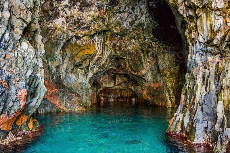 Rock formations and deep blue water in Scandola Nature Reserve, Corsica
