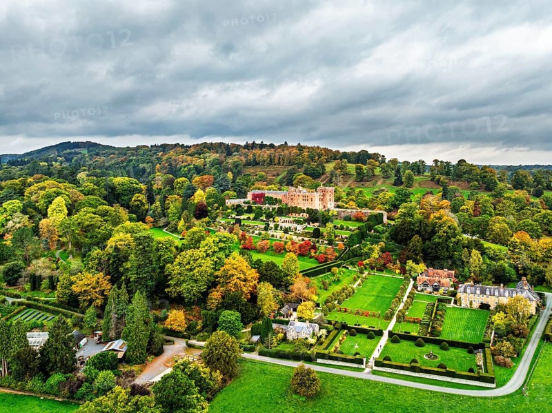 Autumn colours over Powis Castle and Garden from drone, Welshpool, Powys, Wales, England, United Kingdom
