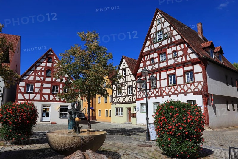 Half-timbered houses and fountains on Rathausplatz, city of Heideck in the district of Roth, Middle Franconia, Bavaria, Germany