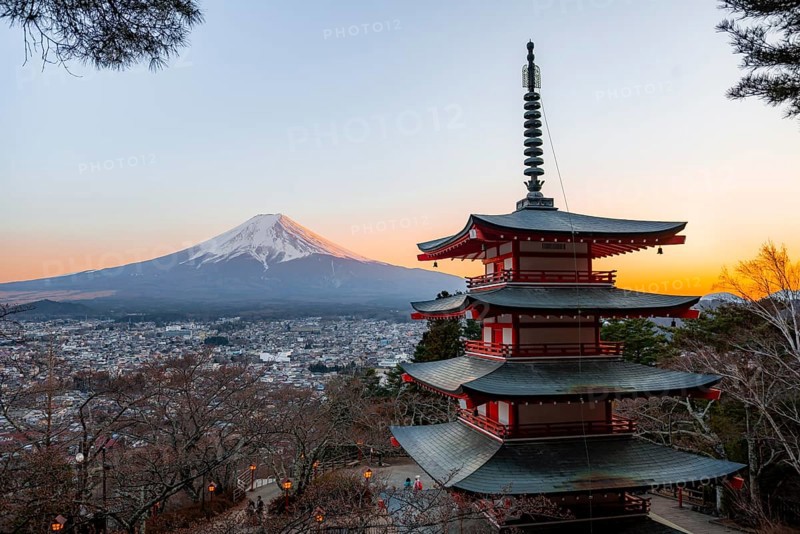 Five-story pagoda of a Shinto Shrine, Chureito Pagoda, with views of Fujiyoshida City and Mount Fuji volcano at sunset, Arakura Fuji Sengen Shrine, Arakurayama Sengen Park, Yamanashi Prefecture, Japan